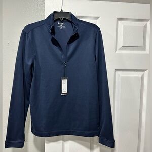 Rhone perfect mid-layer for the office or date night. Navy sweater knit fabric.